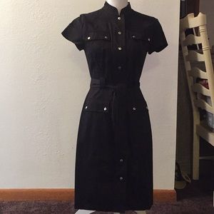 A black Calvin Klein dress with button up and belt
